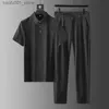 Men's Tracksuits 2023 Summer New Mens Solid Color Two piece Mens Casual Loose Comfortable and Breathable High Quality Plus Size Set M-4XL Q240228