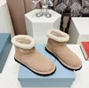 Chaussures de créateurs Femmes Bottes de neige en nylon rembourré Bottines de luxe en peau de mouton Mode Automne Hiver Laine Cuir Espace Coton Bottes chaudes Taille 35-45