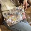 Borse per cosmetici 2024 Borsa per trucco con pochette jacquard ricamata alla moda Borsa per cosmetici da viaggio Prodotti per la cura della pelle