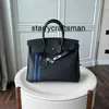 Bolsa de couro genuíno l prata togo couro listra vertical cor saco bolsa moda versátil camada ombro