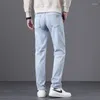 Jeans masculinos primavera e outono para homens com elasticidade solta de pernas retas de tamanho grande negócios moda casual calças compridas