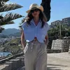 Kvinnors blusar Claceive Sexig Slim White Shirt Summer Lapel ärmlösa skjortor och Streetwear Casual Crop Top Fmelae Clothing 2024