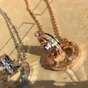 Designer ketting mode-sieraden voor minnaar mannen vrouwen dubbele ring volledige cz twee rijen diamanten hanger achthoekige schroefdop liefde ketting paar romantisch cadeau