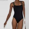 Kvinnors badkläder Ny sexig svart jumpsuit avancerad lantningseffekt Solid Color Triangle Swimsuit Sexig U-formad skönhet 240228