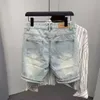Pantaloncini di jeans rotti graffiati da uomo estivi Pantaloni jeans corti strappati elasticizzati di marca di moda per uomo 240226