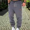 Pantalons pour hommes taille élastique pantalons de survêtement sport respirant avec cordon de serrage conception à bande de cheville pour les entraînements de gymnastique de Jogging