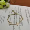 Bracelet designer bracelet luxury bracelets hot sale fashion simple hollowed out lucky grass bracelet light luxury niche design bracelet girlfriend jewellery