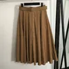 Mode lettre femmes jupes avec ceinture conception fermeture éclair robe courte classique fille dame jupe pour la fête