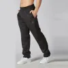 Sweatpants unisex fitness män och kvinnor svettbyxor par byxor träning tyg aktiva byxor botten ben