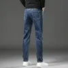 Jeans da uomo in caldo pile invernali pantaloni casual da lavoro slim fit in velluto spesso classico denim di cotone elastico nero blu 240227