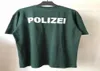 Zagraniczona koszulka zielona Vetements Polizei Tshirt Men Men Police Tekst Drukuj koszulki haftowany litera VTM TOPS x07127725530