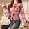 Kobiet Knits Tees Designerka marki marki Saturn Cesarzowa Dowager 2024 Nowy haftowany sweter w kratę kontrast wełna mieszana okrągła szyja krawędź jn8x