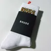 Rhude Sock Men Designer Socks Women Luxury Högkvalitativ Pure Cotton Comfort Deodorization Absorb Sweat Let In Luft Strumpor Fashion Populära svarta sportstrumpor 05ay