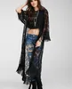 Kvinnors blusar Summer Beach Tassels Maxi Kimonos Women Hollow Out Lace Black Lady Shirts Tops