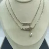 Collana con ciondolo di gioielli di design Collana con ciondolo a forma di cuore placcato oro 18 carati Anello con lettera C Collana con perle di diamanti Gioielli da donna per la festa nuziale