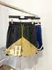 شورت شورت أزياء Rhude Men's Street Basketball Shorts Summer Fashion Beach Pants Men Geny Highs High