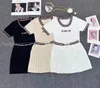 2024 Designer ladies Spring/summer fashion new letter embroidery knitted round neck slim short sleeve + Ladies luxury pleated skirt summer luxury casual 2-piece set