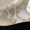 Pendentif Colliers Mode Rétro Imitation Perles Collier Coeur Pour Femmes Simple Style Français Élégant Clavicule Chaîne Bijoux De Fête
