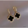 Boucles d'oreilles de créateurs Trèfle à quatre feuilles pour seniors classiques petites boucles d'oreilles vent parfumées New Clover Ear Ring 18k Gold Light Luxury Mens Bijoux Femme