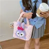 2024 Nouveau mignon dessin animé en peluche poupée de poche petit sac fille coeur fermeture éclair mode tendance étudiant téléphone portable sac de rangement usine en gros stock