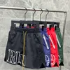 Rhude Fashion Shorts Short de sport de basket-ball de rue pour hommes Pantalon de plage de mode d'été Short rouge et bleu de haute qualité pour hommes