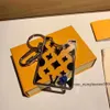 Porte-clés de créateurs longes de mode porte-carte monogrammé porte-clés charme chaîne de voiture charmes clé sac de fleur cadeaux accessoires Y3WS
