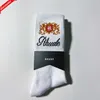 Rhude Socks Men Socks CalceTines女性デザイナー高品質の純粋な綿の快適さブランド代表脱酸化脱臭を吸収するエアストッキング16i4