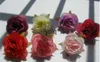Dekoratif çiçek çelenkleri sıcak! 100pcs Yapay 7 Renkli Güller Çiçek Kafası Düğün Dekorasyonu 6cmh24229