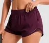 AL-148 Pantaloncini da yoga da donna Completi con abbigliamento da fitness per esercizi Hotty Short Girls che corrono pantaloni elastici Tasche per abbigliamento sportivo Pantaloncini caldi