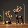 Autre décor à la maison 2pcs statues de figurines de rennes de luxe cerf de Noël ornement de maison artware pour bureau décor à la maison salon bureau bookself Q240229