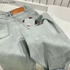 Designer-Jeans für Damen, eingetroffen, hohe Taille, Straße, ausgehöhlter Patch, bestickte Dekoration, lässige blaue gerade Denim-Hosen, Marke Warm E 265