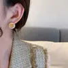 Miui Earringsデザイナー女性オリジナルの品質チャームゴールドとシルバーイヤリングハイグレードフルダイヤモンドイヤリング新しい人気