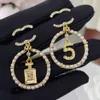 Pendientes de diseñador de marca Pearl EarDrop Pendientes con letras Pendientes clásicos para mujer Joyería para fiesta de boda Pendiente de diamante con incrustaciones de acero inoxidable de plata 925