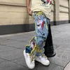Jeans masculinos pintura chinesa bordado remendo denim rasgado para homem streetwear lavado destruído plissado reto jean masculino borlas