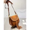 Totes famous cowhide vintage husdon Saddles Tassel bag Totes shoulder bags Luxury Designer Fashion travel pochette womens Leather handbag crossbody small clutch