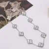 Designer Van cl-ap Pétale laser haute technologie Galvanoplastie en or 18 carats ne se décolore pas dix fleurs en acier titane famille de fans féminins collier de trèfle à quatre feuilles 59BH