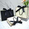 High Quality Pretty Pink Gift Bag Gift Box Ornament Pajama Book Black Handle With Ribbon Paper Box Bag Kraft Packaging 240226