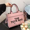 Cool Raffias Weave Designer Bag Marc Brand Tote Bag Men Kvinnor Pink Luxury Handbag Straw Pochette Beach Bag Weekend Clutch Crossbody Shopping Shopping Bag 998