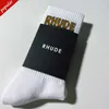 Rhude Men Socks Womens New Letters Pure Cotton Eurotean American American Street Trend Sports Casual Jogging Basketball Socks Luxury Antibacterial Breateable Sports SN6G