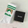 Rhude Men Choques femme créatrice chaussette de luxe Mode Antibactérien Déodorant Sports Socks Populaires Coton High Quality Lettre en tricot blanc noir noir So 7V7X