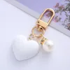 Portachiavi Portachiavi con ciondolo a forma di cuore in resina con ciondoli di perle Y2K Portachiavi Borsa Decorazione Portachiavi per auto Regalo per donne Ragazze