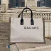 المصمم Rive Gauche Beach Tote Bag Summer Bag Bag Canvas ونسج جلدي كبير السعة اليدوية ذات الأزياء الفاخرة للتسوق حقيبة يدوية على أعلى الكليتين توتشات السفر