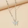 Pendentif Colliers Collier papillon brillant exquis collier de cristal doré chaîne dames bijoux de fête de mariage cadeau 230831