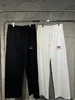 Plusowe spodnie męskie duże spodnie sportowe z rozdartymi i rozdartymi wydrukowanymi haftowanymi bawełnianymi spodniami T32D