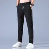 Pantaloni da uomo Pantaloni da uomo in seta di ghiaccio Tinta unita Vita media Pantaloni larghi e traspiranti a gamba dritta Pantaloni sportivi sottili ad asciugatura rapida 230831