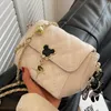 Bolsas de noche Mensajero explosivo Pequeño bolso cuadrado Textura avanzada Verano de mujer 2023 Moda de moda