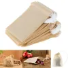 100 PCS/LOT TEA FILTER BAG STRAINERS TOOLS NATURAL UNLEICEDED WOOD PULP PULP PAPER DOWSTRING POUCH FY3735 091付き空きバッグを空のバッグ