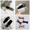 Lettere designer clip barrette fiore arco stile classico per fascino femminile femminile clip per capelli con botto per capelli di alta qualità