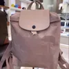 Luxury Tote Bags Fashion Designer Longchaap stor kapacitet ryggsäck kvinnors mini handväska kapacitet %90 av grossist utomhus resväska kohud axelväskor