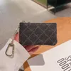 Portafogli di lusso con cerniera piccola Uomo Donna Designer Portachiavi Portamonete Portamonete in vera pelle con lettera in rilievo Porta carte di credito Poke per cuffie Pochette regalo all'ingrosso